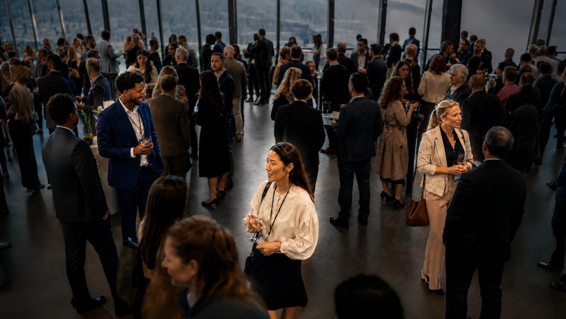 Attendees networking at a professional event with live Drop profiles highlighted over the crowd